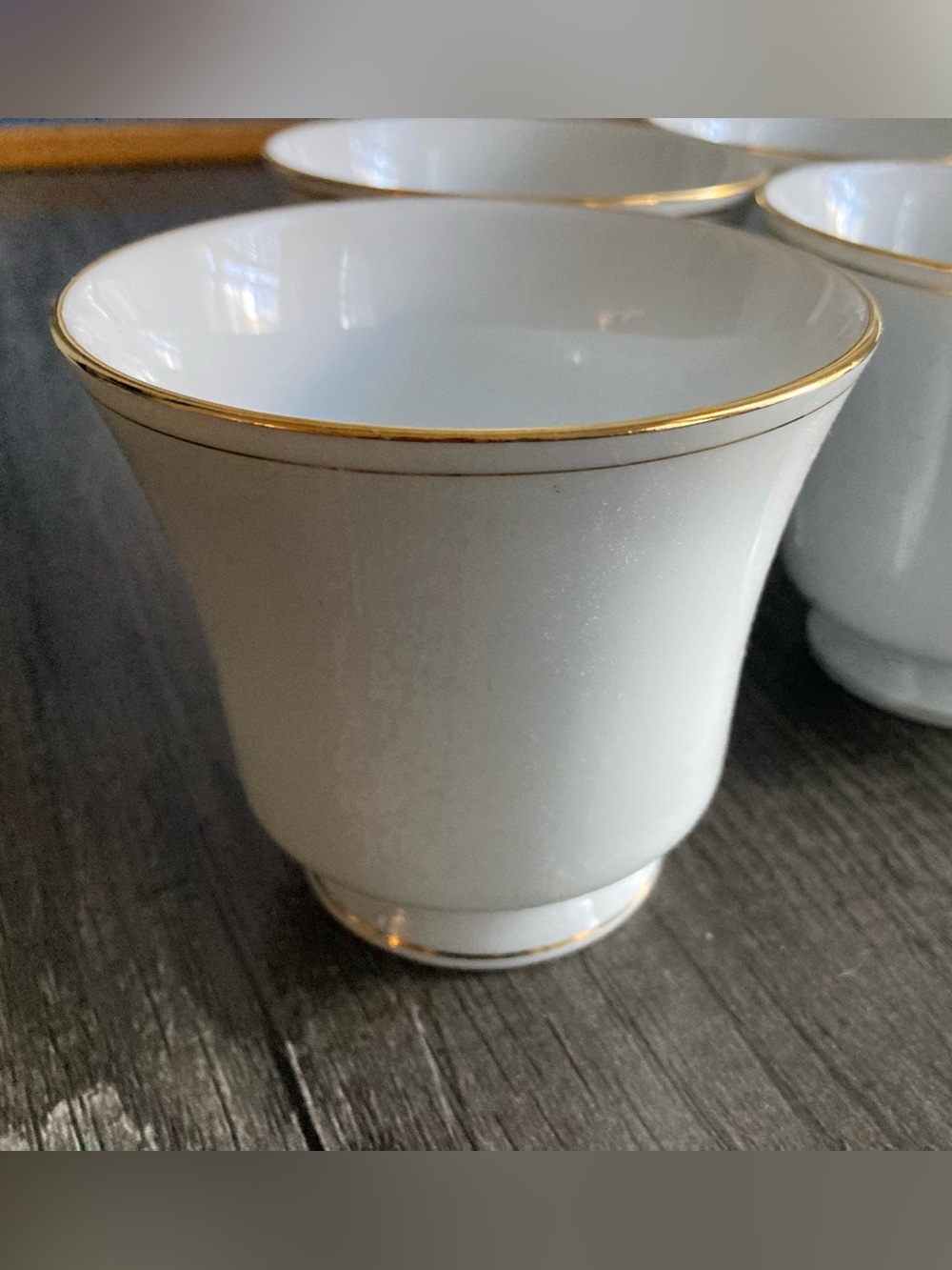 White Porcelain Teacup with Gold Trim